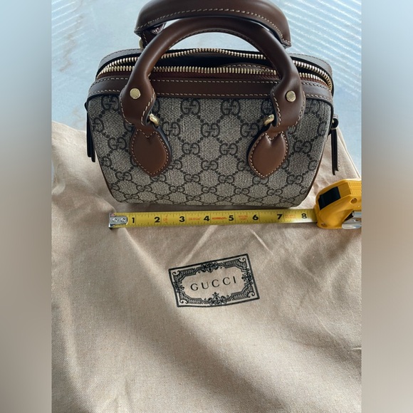 Gucci mini top handle bag. Like new- perfect condition. 
Dust bag included - Picture 6 of 7